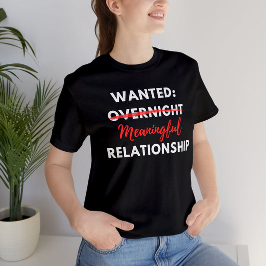 Wanted: Meaningful Overnight Relationship - Soft Cotton Unisex Adult Tee by clothezy.com in Black with Model - Buy Now